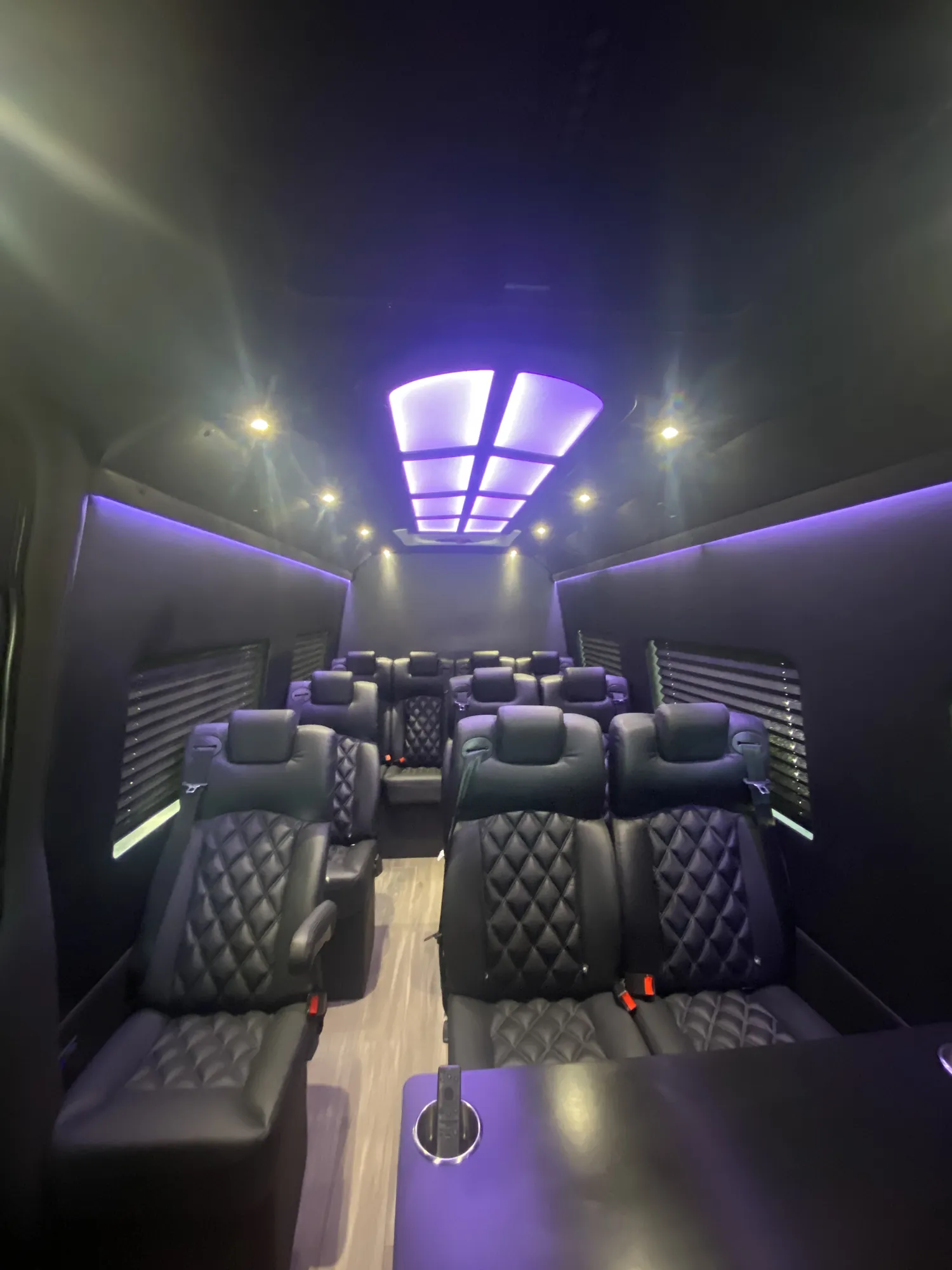 Executive Sprinter center aisle and illuminated ceiling — Sprinter van services in NYC