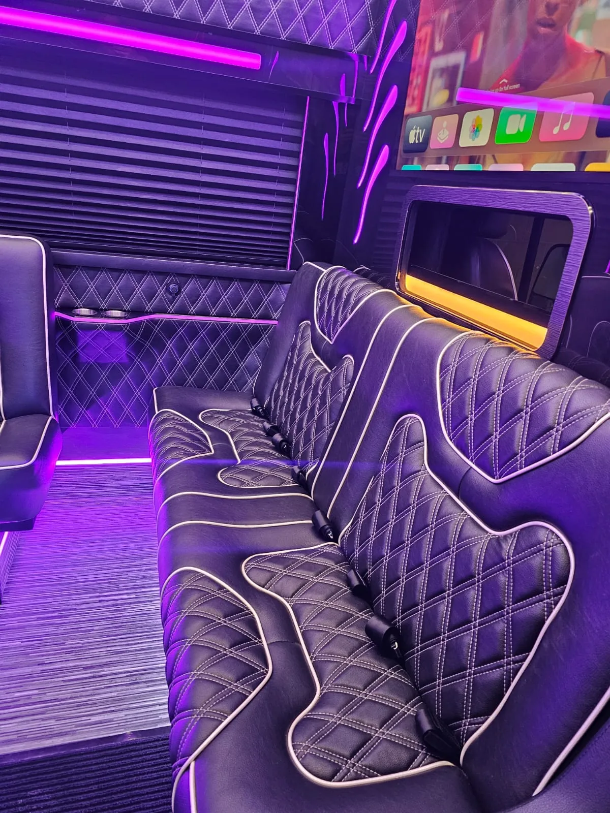 Limo Sprinter quilted bench seating and purple lighting — Wedding Shuttle Service Long Island by Sprinter with Driver
