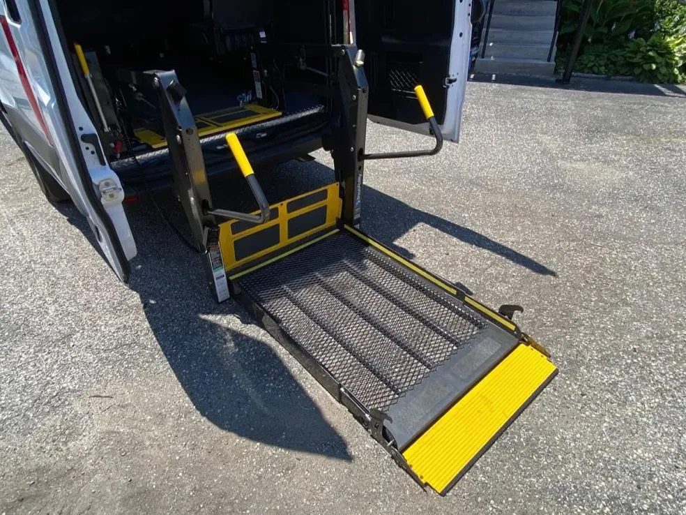 Wheelchair-accessible Sprinter extended wheelchair lift at the rear entrance — Wheelchair Accessible Van NYC with Driver